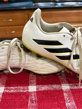 adidas Kids White Soccer Cleats with Black Stripes and Yellow Trim